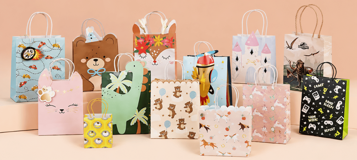 Bunte Geschenktüten für Kindergeburtstage mit Tier-, Dinosaurier-, Schloss-, Einhorn- und Weltraummotiven für Mitgebsel und Gastgeschenke.